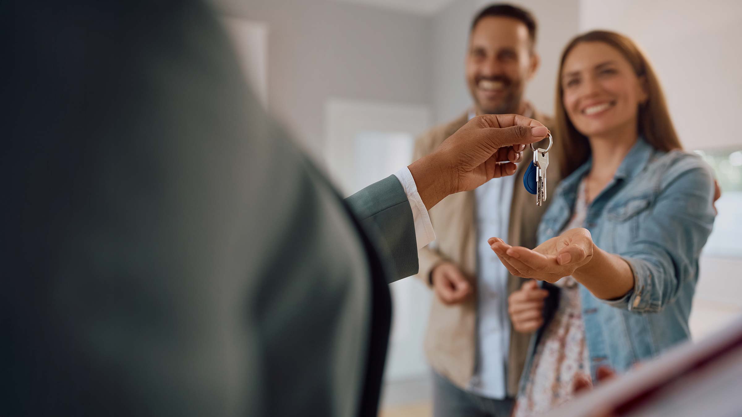 Couple receiving house keys